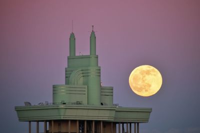 Low angle view of building against sky at night