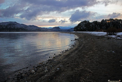 Scenic view of sea against sky at sunset