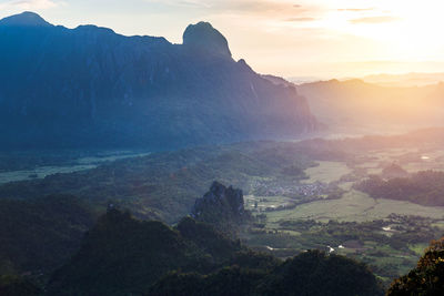 Scenic view of mountains against sky during sunset