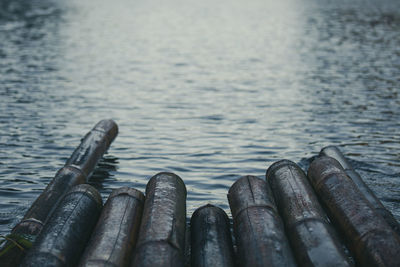 Close-up of metal floating on river