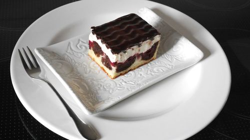 High angle view of cake in plate on table