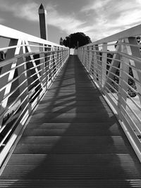 Footbridge against sky