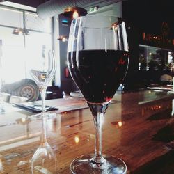 Close-up of wine glass on table at restaurant