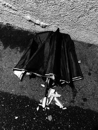 Close-up of clothes drying against wall