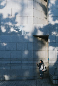 Full length of man walking against sky