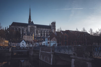 View of buildings against sky in city