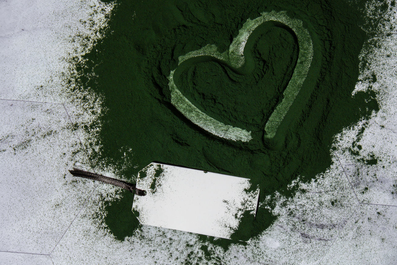 green, no people, high angle view, heart shape, number, drawing, creativity, communication, day, outdoors, nature