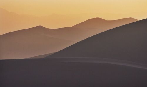 Scenic view of desert during sunset