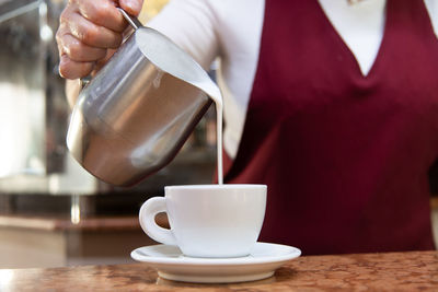 Close-up of coffee cup on table in cafe