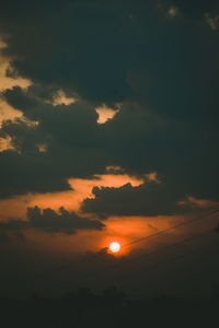 Low angle view of dramatic sky during sunset