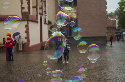 Close-up of bubbles on city street