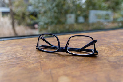 Close-up of eyeglasses on table