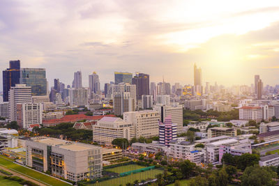 Modern office buildings, condominium in bangkok city downtown with sunset sky in bangkok , thailand