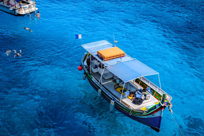 High angle view of boat moored in sea