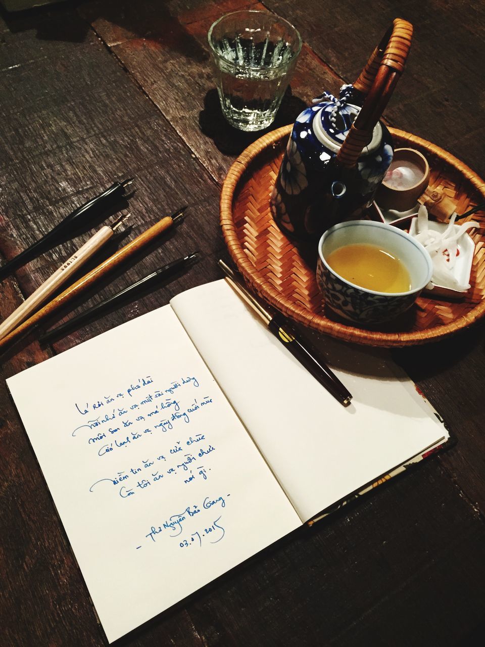 indoors, table, high angle view, still life, food and drink, close-up, spoon, fork, coffee cup, drink, plate, no people, coffee - drink, book, freshness, refreshment, communication, cup, paper, wood - material