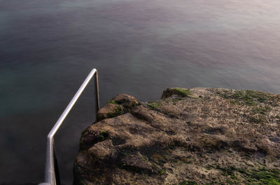 High angle view of rock formation in sea