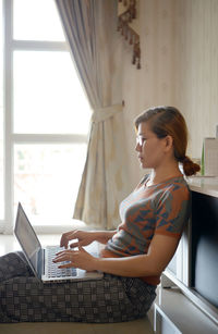 Woman use computer laptop for work from home