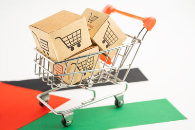 High angle view of shopping cart on white background