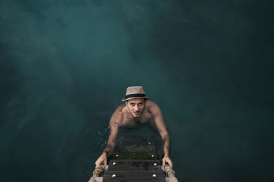 Man swimming in sea