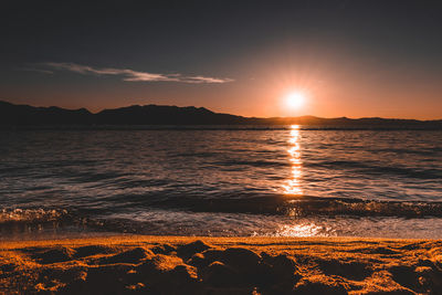 Scenic view of sea against sky during sunset