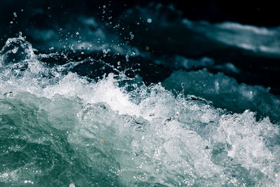 Close-up of sea waves splashing on shore