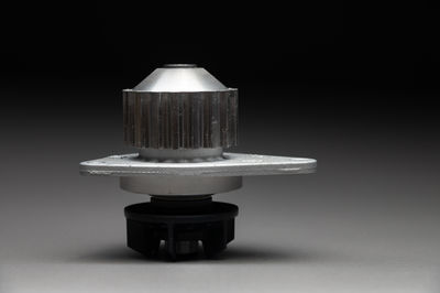 Close-up of water bottle against black background