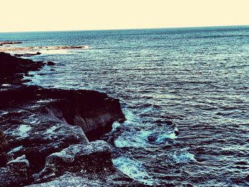 Scenic view of sea against clear sky