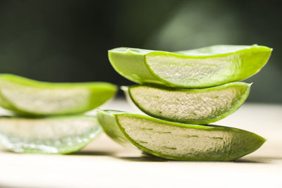 Close-up of fresh green leaves with pebbles