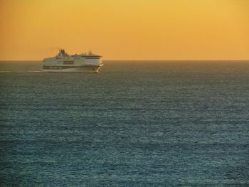 Scenic view of sea at sunset