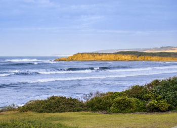 Scenic view of beach and sea against sky