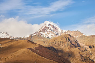 Scenic view of mount kazbek. high quality photo.
