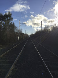 Railroad tracks against sky