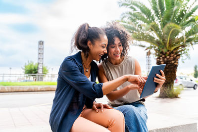 Young woman using mobile phone