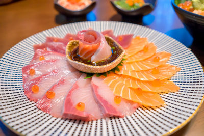 High angle view of fish in plate on table