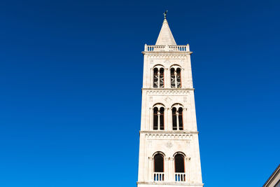 Low angle view of building against blue sky