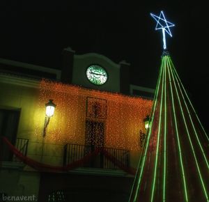 Low angle view of illuminated building at night