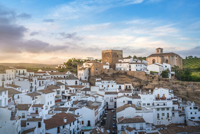 High angle view of townscape against sky during sunset