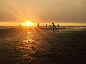 Scenic view of sea at sunset