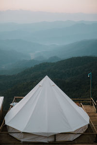 Tent on mountain against sky