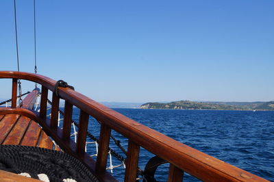 Scenic view of sea against clear blue sky