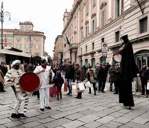 People in front of building