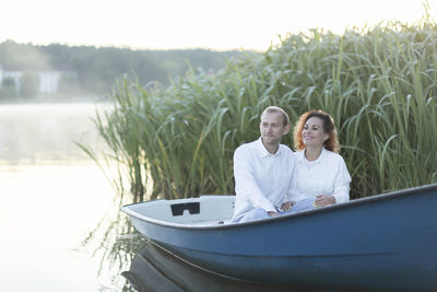 Portrait of woman sitting in boat
