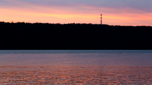 Scenic view of sea at sunset