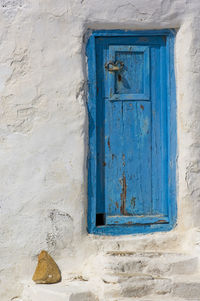 Blue window of old building