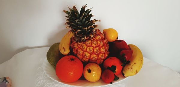 Close-up of orange fruits on table