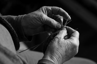 Cropped image of woman knitting