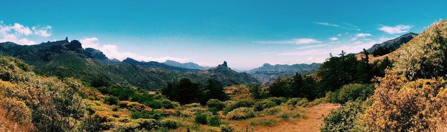 Scenic view of mountains against sky at sunset