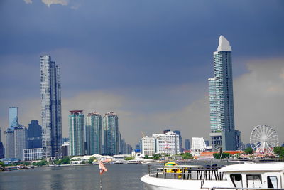 Modern buildings in city against sky