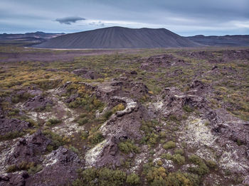 Scenic view of volcanic landscape against sky