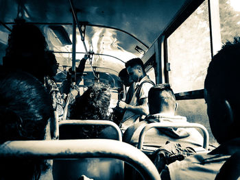 High angle view of people sitting in bus